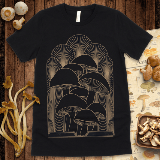 Art deco style black mushroom cluster outlined in gold with fan-pattern background