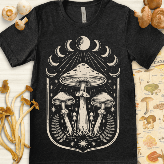Cream-on-black design of tall mushrooms under moon phases with stars and ferns in a symmetrical, celestial layout.