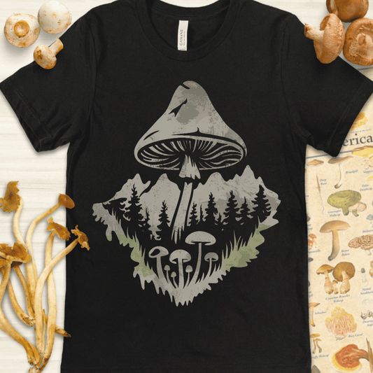 Illustration of a mushroom containing a mountain landscape, pine trees, and forest floor fungi in a nature-inspired double-exposure design.